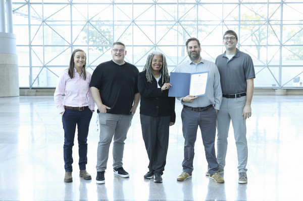 Group photo accepting student award