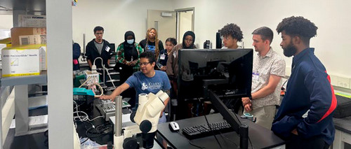 demo participants looking at instructor