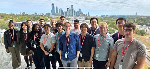 Edge scholars gorup photo with city of Austin in bacground