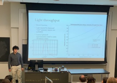 Noah Meyers presenting his results at the REU session at University of Rochester.