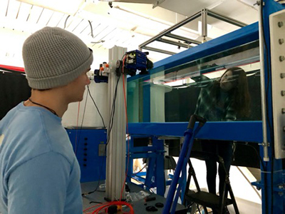 Caroline Cardinale (ME ’21) and Kai Kindred (ME ’20) calibrating a setup in the water channel.