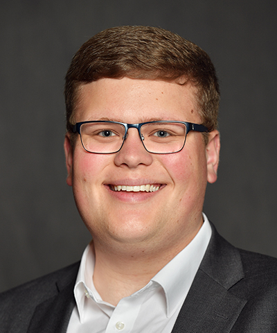 Headshot of Kyle.