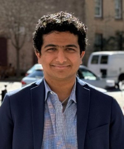 Headshot of Karthik.