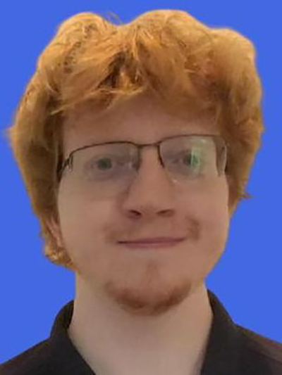Headshot of Nicholas.