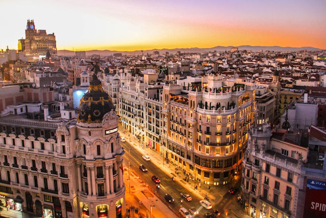 An aerial view of a portion of the city at sunset.