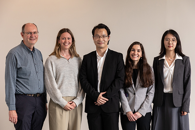 A group photo of the new faculty.