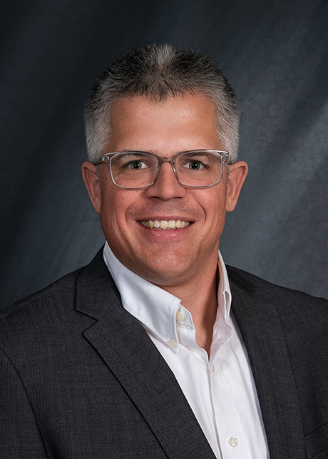 Headshot of Wyatt Tenhaeff.