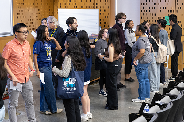 A group of attendees networking.