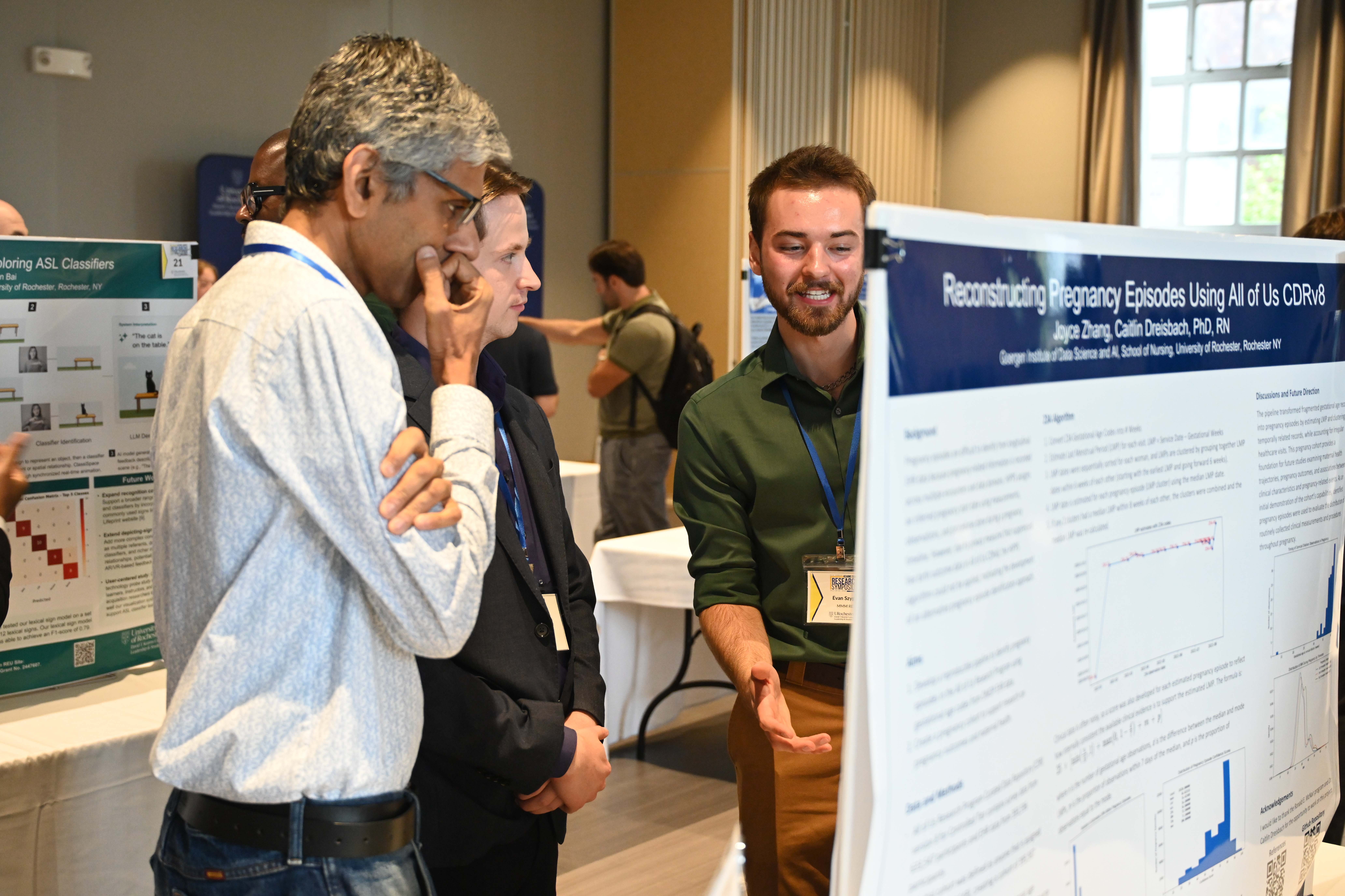 Student presenting at the 2026 REU Research Symposium.