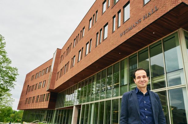 Mujdat Cetin in front of Wegmans Hall.