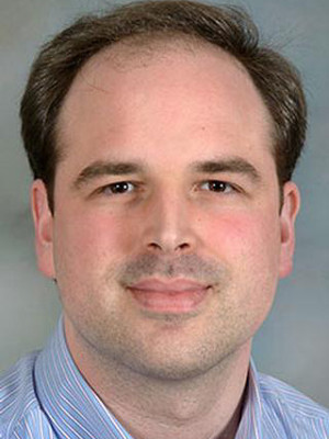 David Mathews smiling. 
