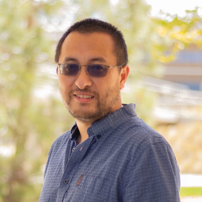 Headshot of Professor Wei Xiong.