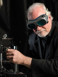 Prof. Wayne Knox wearing goggles to prevent eye damage from lasers